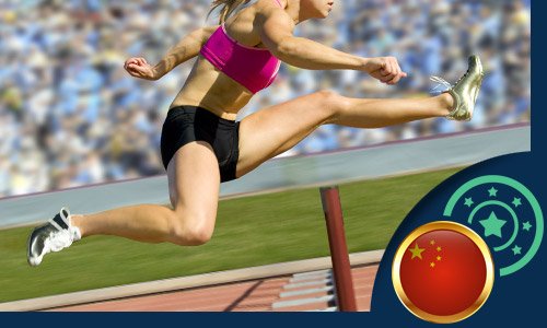 a woman athlete jumping a hurdle