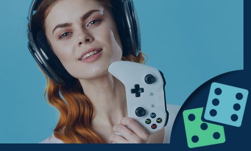 woman gamer with headphones on holding a gaming console